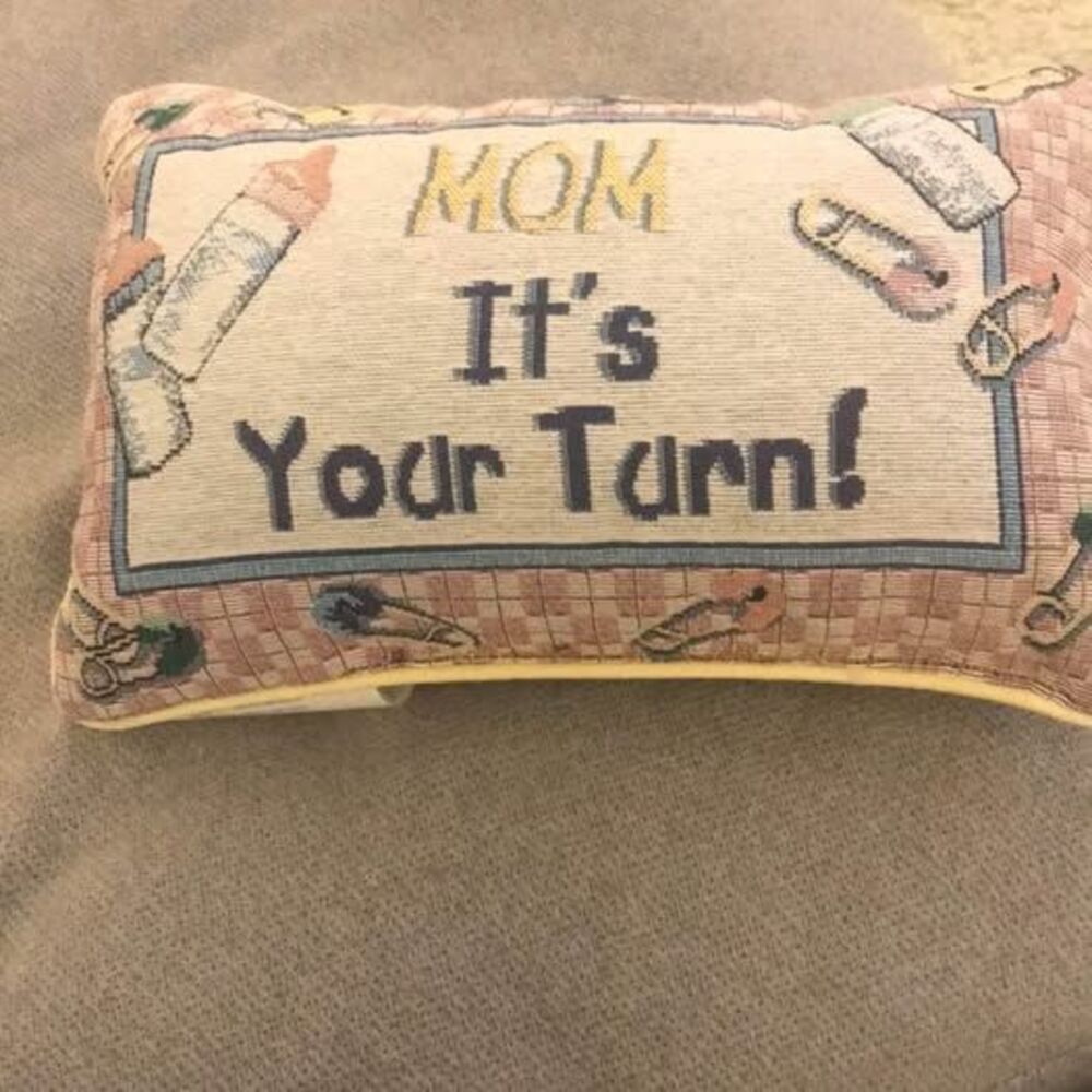 Decorative stitch pillow with “it’s your Turn” pillow. Great for a nursery or ba